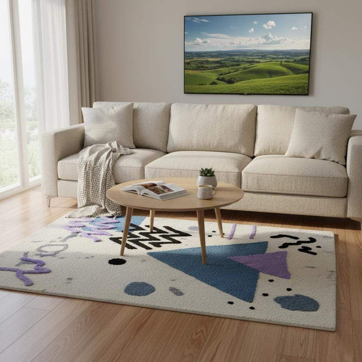 Translation missing: es.Abstract geometric rug with pastel blue and lavender shapes on ivory base, soft bouclé texture, modern Memphis style area rug for living rooms and nurseries