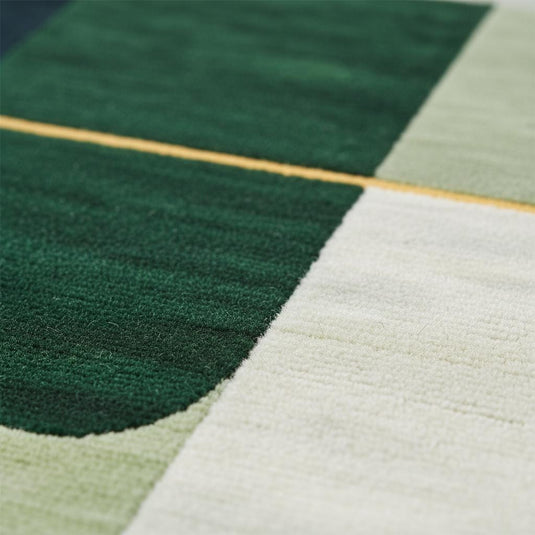 Translation missing: es.Modern geometric rug in olive green, navy, and forest color blocks, hand-tufted wool, luxury living room decor