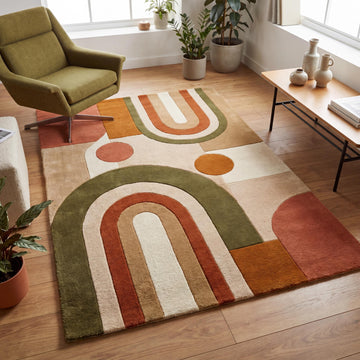 Translation missing: es.Handmade modern abstract wool rug with geometric arch patterns in olive green, rust, beige, and terracotta styled in a mid century modern living room __etsy:8048444035