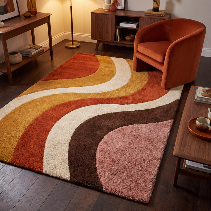 Translation missing: es.Hand tufted wool area rug with retro wave pattern in rust, mustard, ivory, and blush tones styled in a modern living room __etsy:8048425829