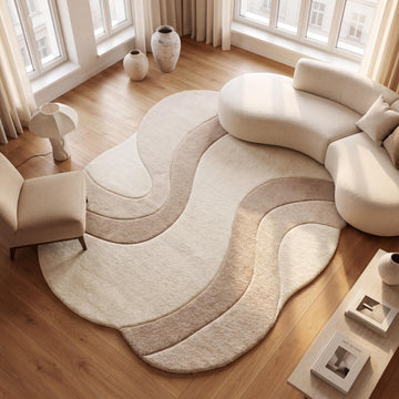 Translation missing: es.Handmade modern abstract wool rug in ivory and beige tones styled in a minimalist living room with curved cream sofa and warm wood flooring __etsy:8000518650