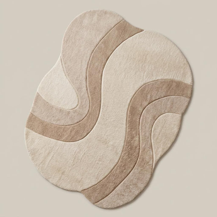Translation missing: es.Organic contemporary area rug with sculpted abstract design placed beneath modern curved sectional sofa in a Japandi-inspired interior __etsy:8000518502