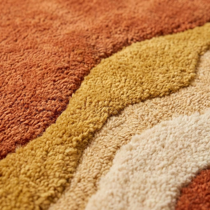Translation missing: es.Close-up of hand-tufted wool rug texture showing dense cut pile and soft fibers in warm earthy tones __etsy:8032952633