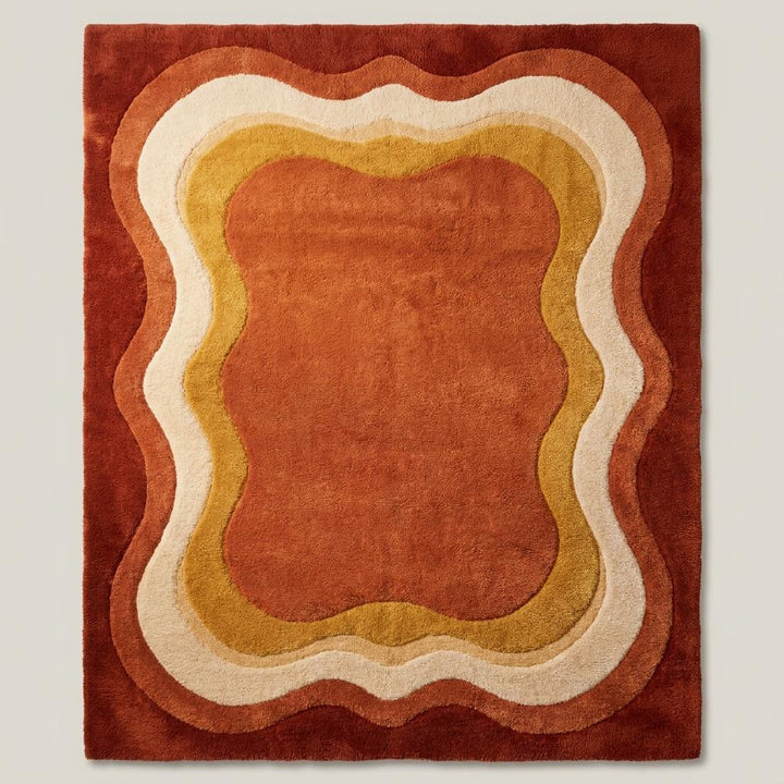 Translation missing: es.Contemporary retro wave area rug in rust and mustard colors placed beside a modern accent chair __etsy:7985009136