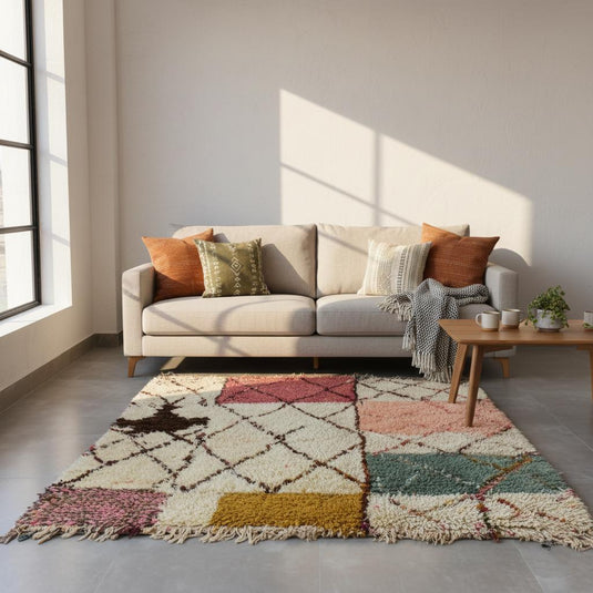 Translation missing: es.Soft shag boho area rug featuring multicolor design and tufted texture on a gray tile floor next to a contemporary chair