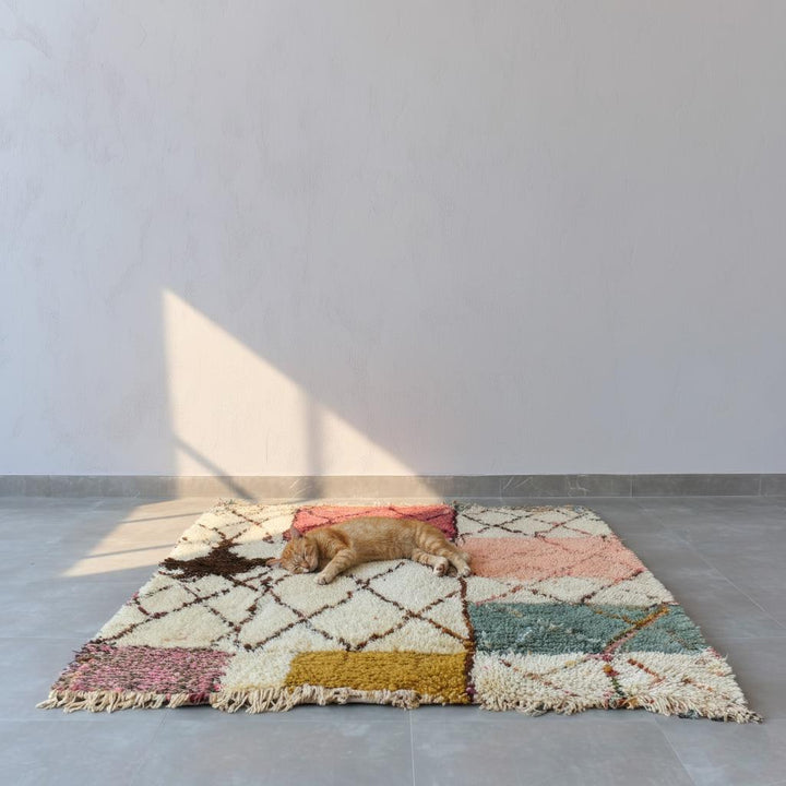 Translation missing: en.Colorful geometric Moroccan rug with cozy shag texture displayed in a modern minimalist home interior