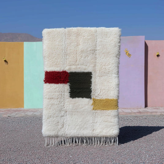 Translation missing: es.Moroccan Beni Ourain ivory wool rug with abstract color blocks and plush shaggy texture