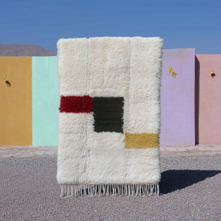 Translation missing: es.Moroccan Beni Ourain ivory wool rug with abstract color blocks and plush shaggy texture
