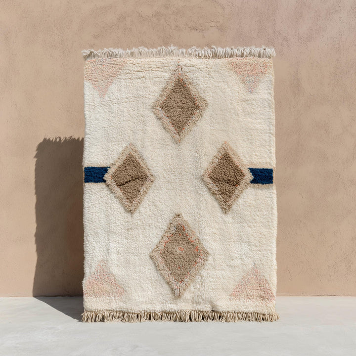 Translation missing: es.Moroccan Diamond Wool Rug in cream, taupe, and navy with plush texture and geometric boho design
