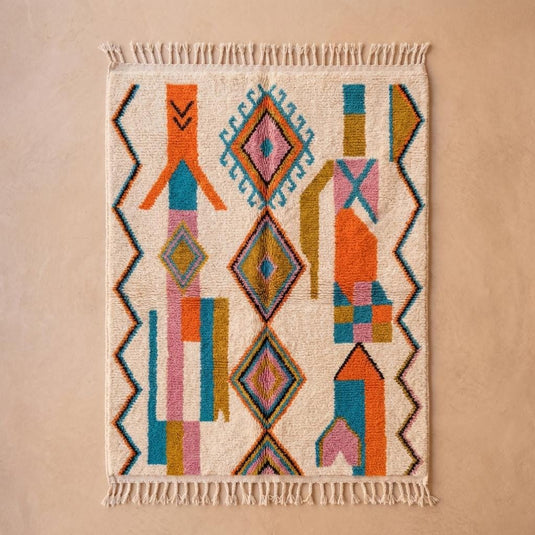 Translation missing: es.Ivory boho rug with vibrant terracotta turquoise and mustard geometric motifs