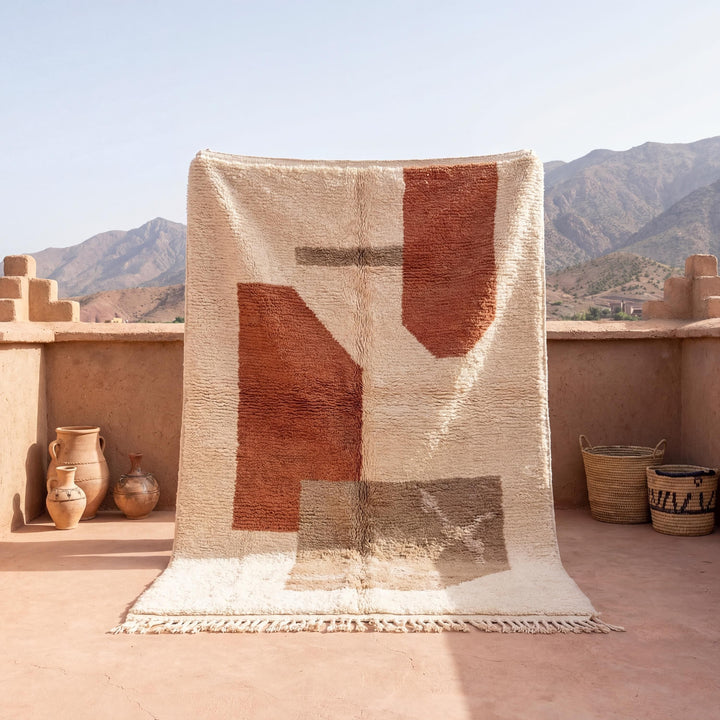 Translation missing: es.Moroccan style geometric rug with ivory and terracotta abstract boho design and plush textured surface