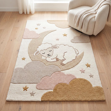 Translation missing: es.Handmade nursery rug with sleeping lamb on crescent moon surrounded by soft clouds in beige and blush pink tones for cozy kids bedroom décor __etsy:7994290724