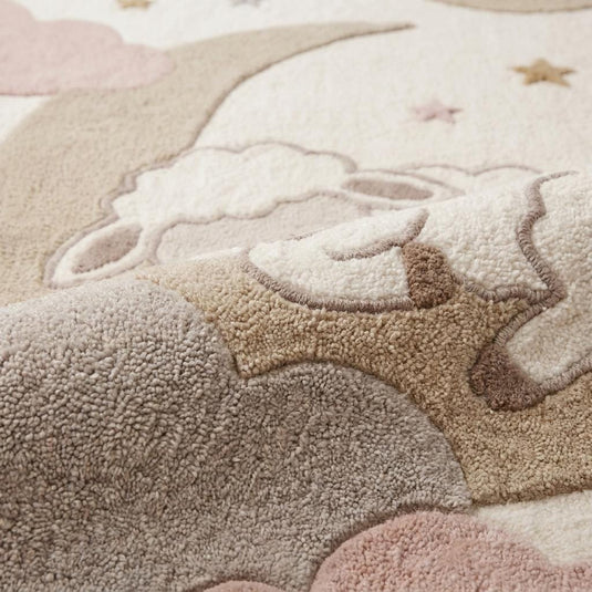Translation missing: es.Close-up texture of hand-tufted wool blend nursery rug showing raised cloud details, soft cut pile surface, and handcrafted stitching __etsy:8042227113