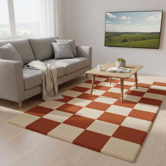 Translation missing: es.Mid-century style orange and cream carpet placed in living room with plants and wood flooring