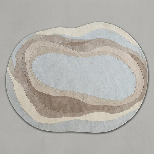 Translation missing: en.Beige cream organic wavy rug with irregular shape and soft texture for modern minimalist decor