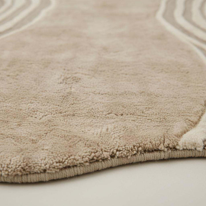 Translation missing: en.Organic wavy rug with beige irregular shape and soft plush texture for modern minimalist decor