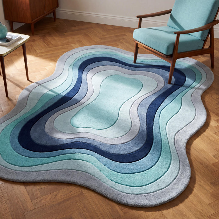 Translation missing: es.Handmade abstract wool rug with organic wavy shape in aqua blue and navy tones styled in a modern living room __etsy:8054066951