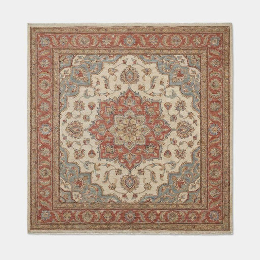 Translation missing: es.Floral medallion pattern detail of hand knotted Oushak rug with classic Persian-inspired motifs and soft color transitions