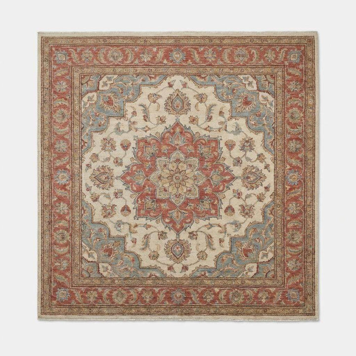 Translation missing: es.Floral medallion pattern detail of hand knotted Oushak rug with classic Persian-inspired motifs and soft color transitions