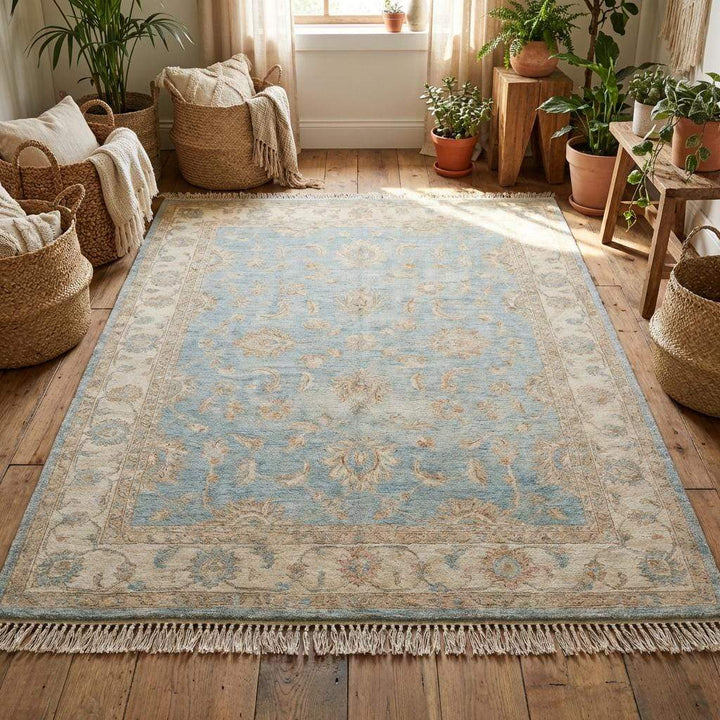 Translation missing: es.Traditional Oushak style rug with pale blue field and ivory floral motifs