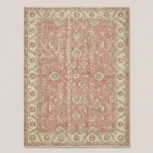 Translation missing: en.Pink floral hand knotted rug styled in bright living room with neutral décor