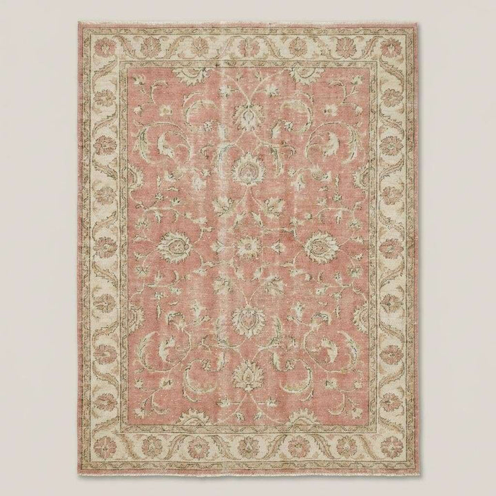 Translation missing: en.Pink floral hand knotted rug styled in bright living room with neutral décor