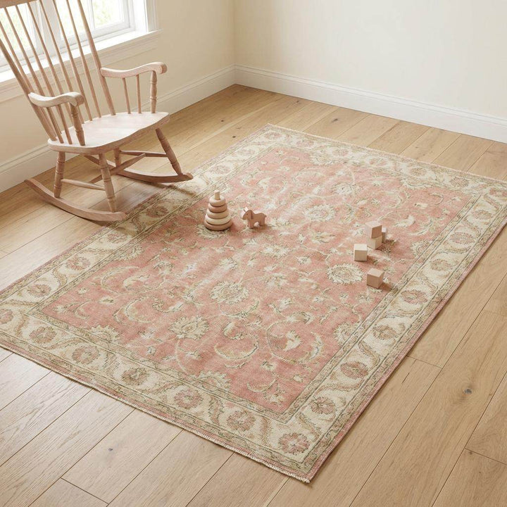 Translation missing: en.Elegant handmade wool area rug with classic floral pattern and soft pastel tones