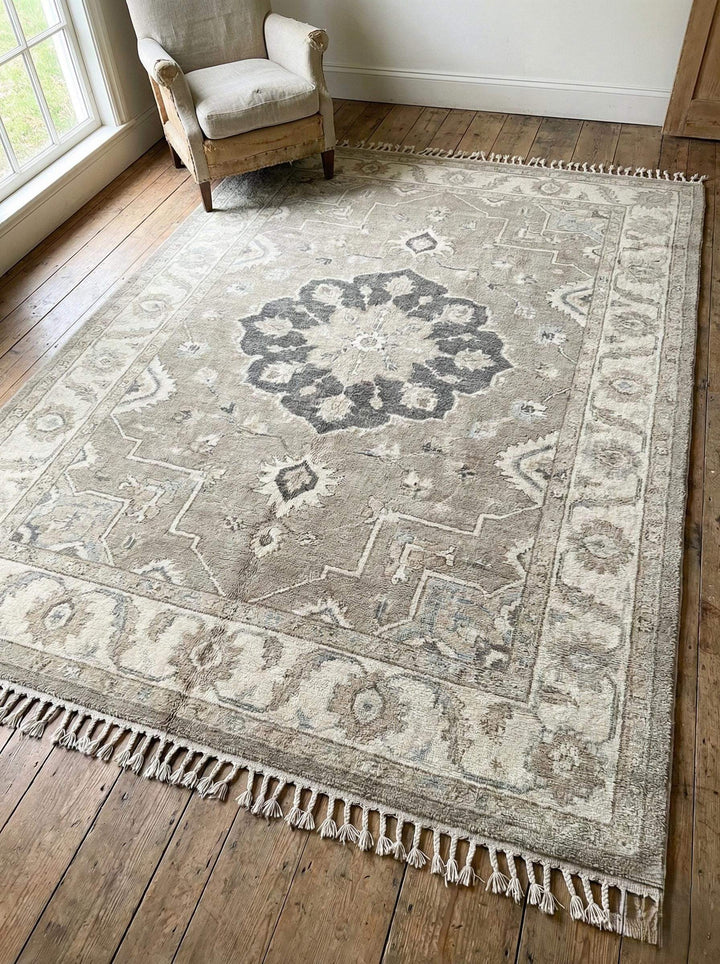Translation missing: es.Oushak style hand knotted wool area rug with neutral medallion design and soft texture