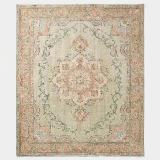 Translation missing: es.Hand-knotted Oushak style wool rug with soft green floral medallion design