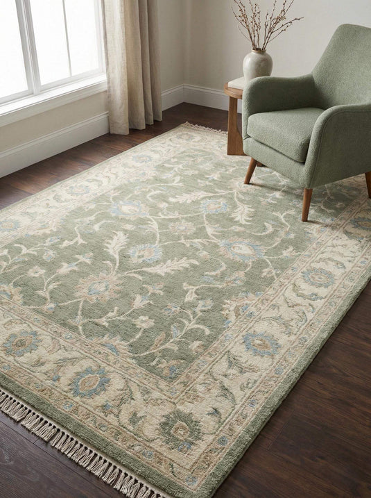 Translation missing: es.Oushak style hand knotted wool rug in sage green with ivory border and floral details
