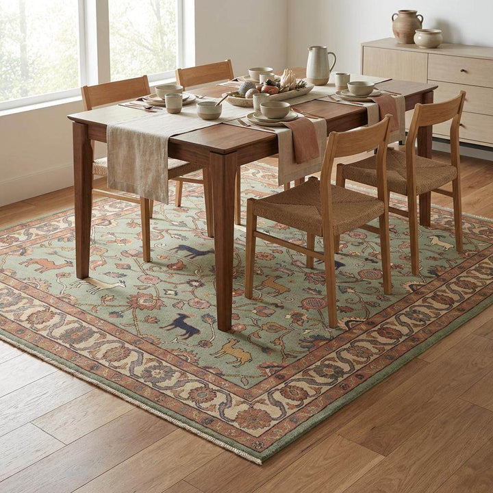 Translation missing: es.Sage green hand knotted rug with terracotta, cream and rust tones showing natural wool color variation