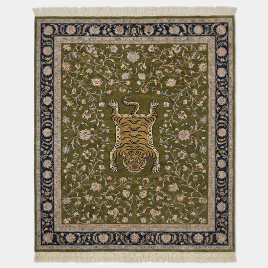Translation missing: es.Traditional Persian tiger motif rug with navy floral border on wooden floor