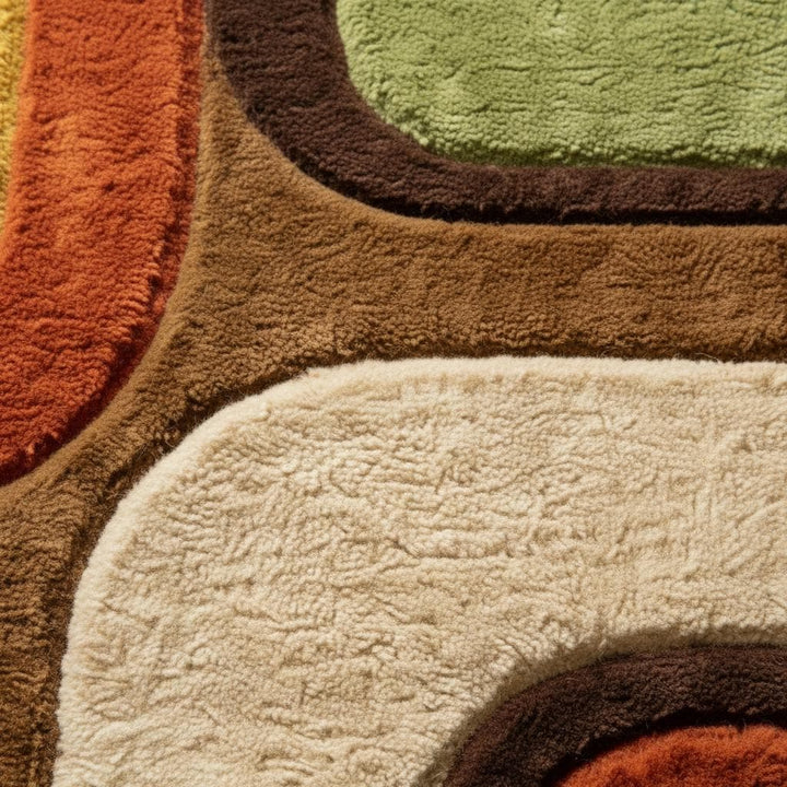 Translation missing: en.Close-up of hand tufted plush rug showing dense high-pile texture, soft fibers, curved geometric edges, and detailed craftsmanship