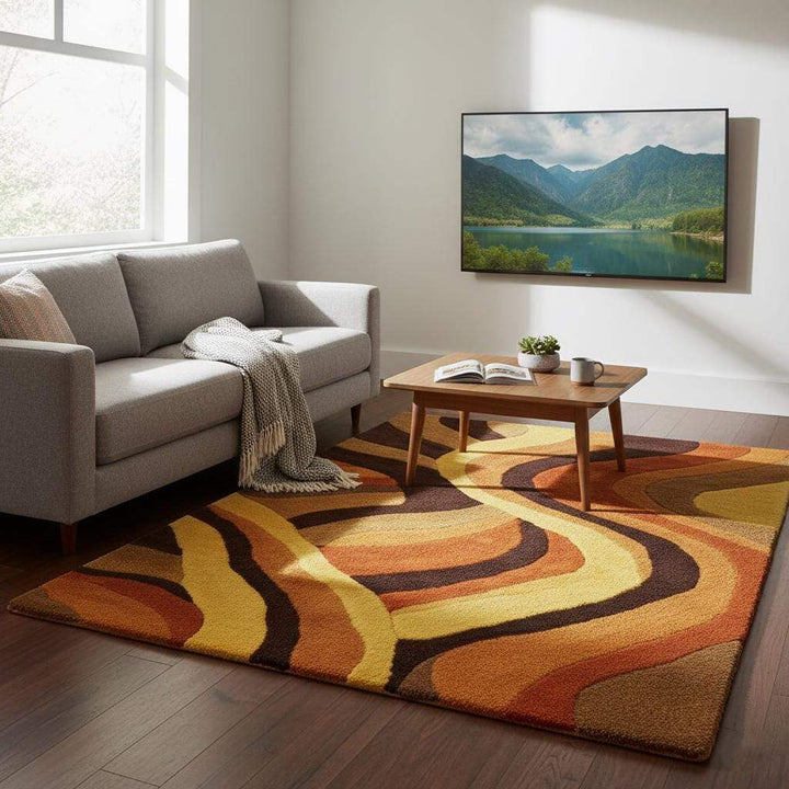 Translation missing: en.Orange and yellow retro shag rug with bold flowing lines on hardwood floor