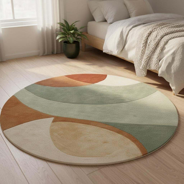 Translation missing: en.Round hand-tufted wool rug with sage terracotta geometric circle design and plush texture