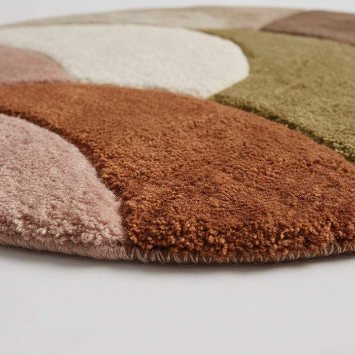 Translation missing: en.Round retro geometric wool rug with thick pile and earth tone colors