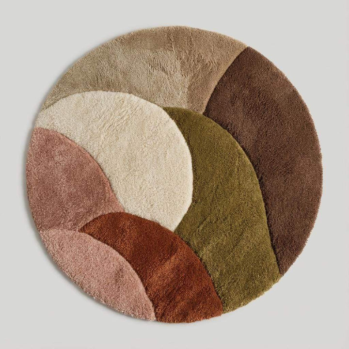 Translation missing: en.Round retro geometric wool rug with thick pile in earthy tones and mid century modern design