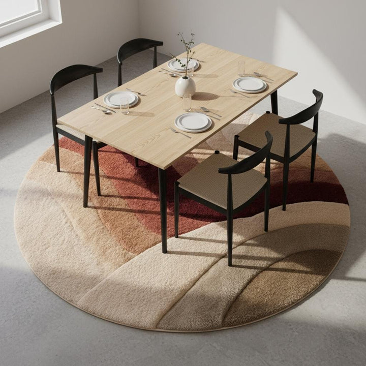 Translation missing: en.Round tufted wool rug with sunset earth tones, plush pile, and textured circular boho design