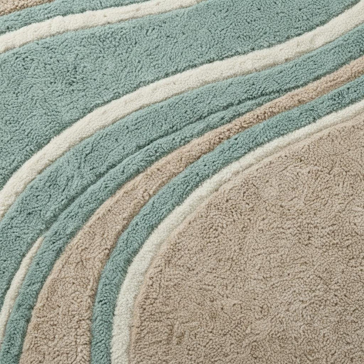 Translation missing: en.Modern teal beige round wavy rug with abstract wave pattern and plush hand tufted fibers