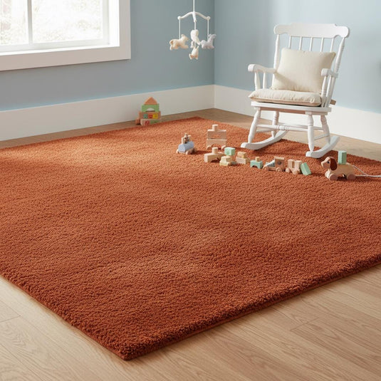 Translation missing: es.Rust shag rug in cozy living room with vintage high pile and retro orange tones