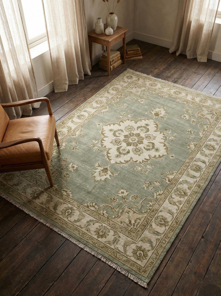 Translation missing: en.Hand knotted sage green Oushak wool rug with floral medallion design