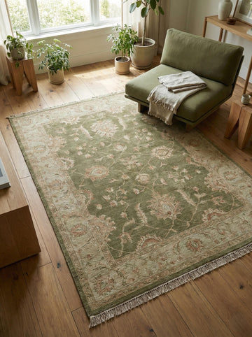 Translation missing: fr.Sage green Oushak hand-knotted wool rug with vintage floral design and artisan fringe edges