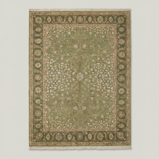 Translation missing: es.Traditional Oushak style wool rug with muted green field and decorative floral border