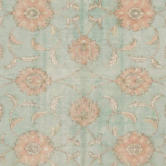 Translation missing: en.Close-up of hand knotted wool pile showing natural fiber texture, tight knot structure, and soft matte finish typical of authentic Oushak rugs