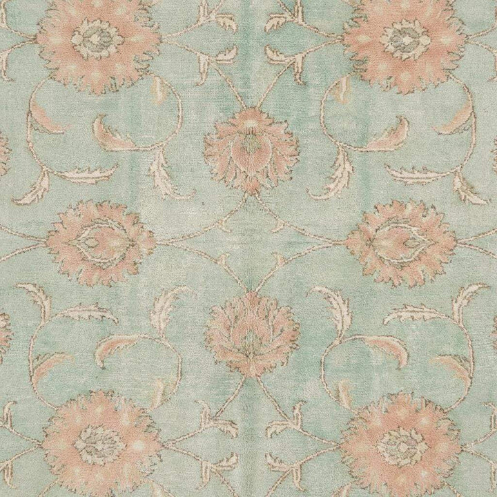Translation missing: en.Close-up of hand knotted wool pile showing natural fiber texture, tight knot structure, and soft matte finish typical of authentic Oushak rugs
