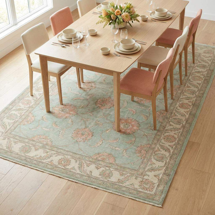 Translation missing: en.Pastel Oushak wool rug with detailed border and floral motifs, ideal for bedroom or transitional home interiors