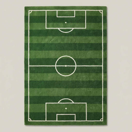 Translation missing: es.Kids playroom styled with soccer field rug defining play area, bright green sports rug adding playful energy to family-friendly interior