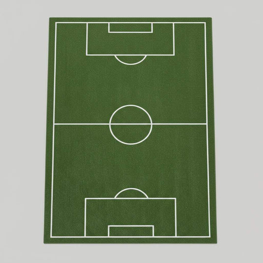 Translation missing: es.Sports-themed rug styled in modern room with sofa and cabinet, adding playful soccer decor