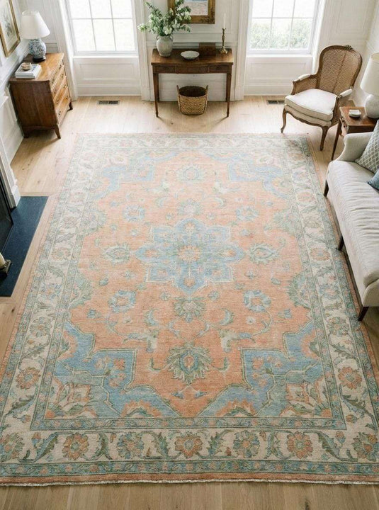 Translation missing: en.Soft peach Oushak area rug with blue medallion, hand knotted wool Persian design