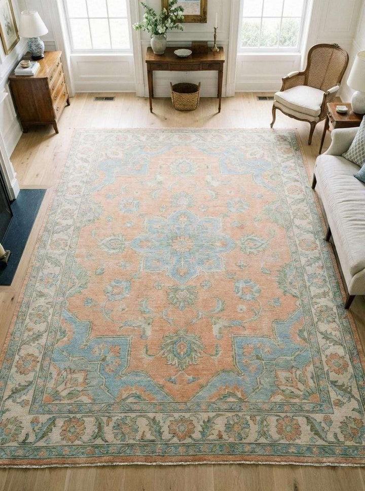 Translation missing: en.Soft peach Oushak area rug with blue medallion, hand knotted wool Persian design